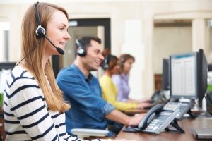 New Life Insurance at desk taking calls and having success