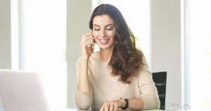 Female smiling on phone